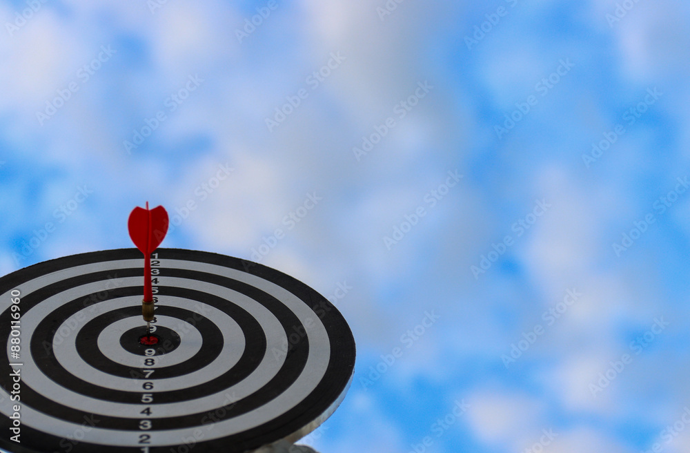 Dart board with red arrow for business planing and successful concept Dart board with red arrow for business planing and successful concept