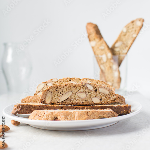 almond biscotti on a white plate, almond cantucci cookies on a white plate, biscotti cookies or twice baked cookies