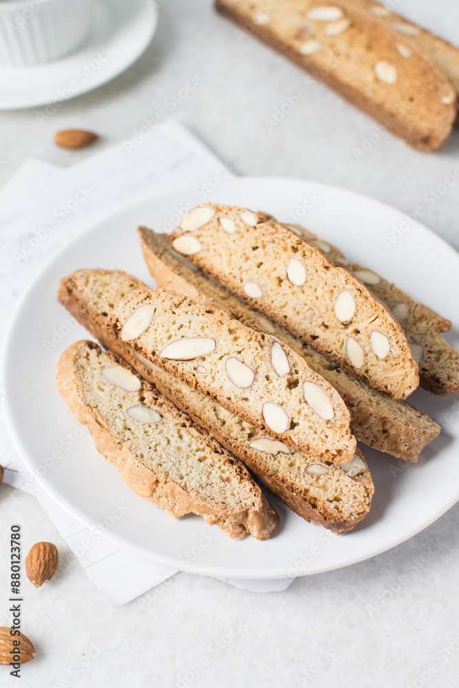 almond biscotti on a white plate, almond cantucci cookies on a white plate, biscotti cookies or twice baked cookies almond biscotti on a white plate, almond cantucci cookies on a white plate, biscotti cookies or twice baked cookies