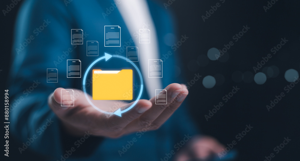Document Management System concept. Online document file data software for efficient archiving. Businessman holding folder and document icon software, online documentation database and digital file.