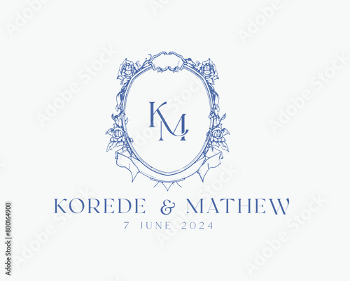 Wedding logo crests vector design royal style blue color illustration monogram crest design with KM initial surrounded by baroque style intricate motifs
