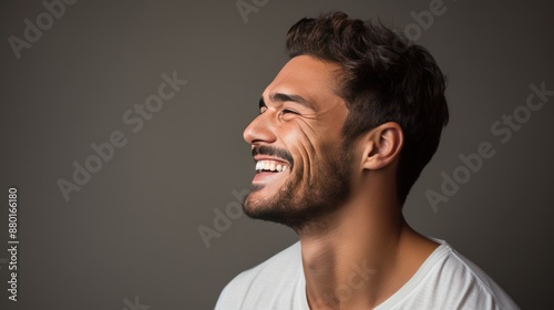 Side view portrait of a man smiling, 