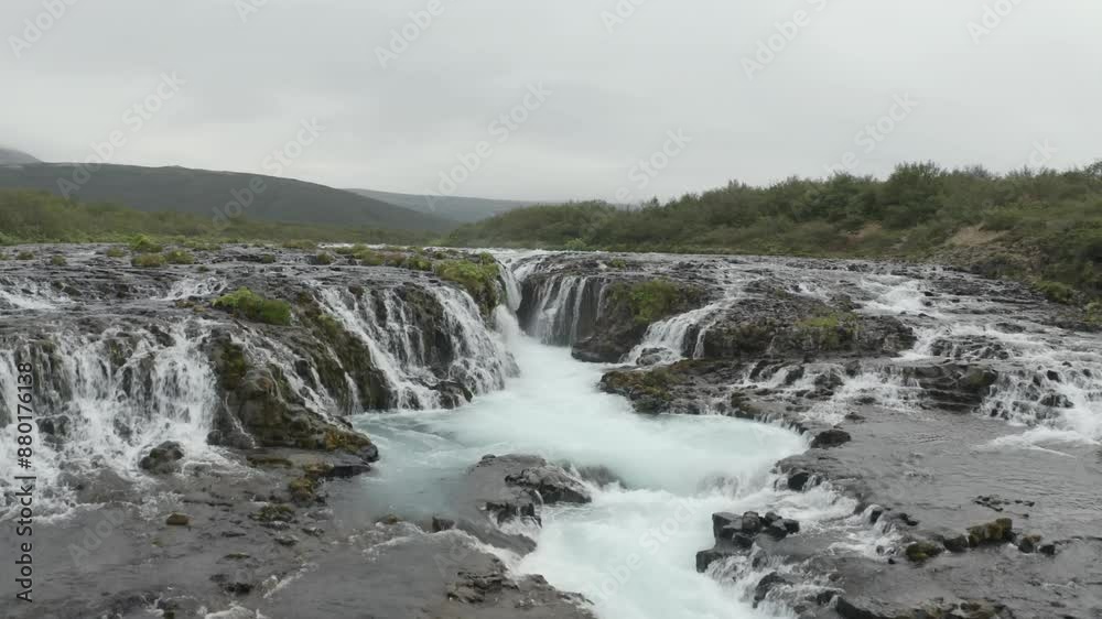 Steadicam aerial video of Berura river with waterfall in Roarfoss, Iceland Steadicam aerial video of Berura river with waterfall in Roarfoss, Iceland