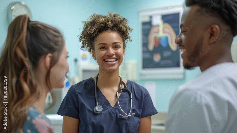 Fototapeta premium Smiling Nurse with Stethoscope Engaging with Colleagues in a Friendly Hospital Environment
