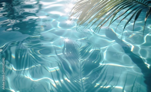 Sunlight reflecting off turquoise water with palm leaf shadows, evoking a tranquil and tropical atmosphere perfect for relaxation