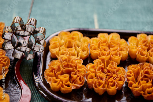 Thai honeycomb cookies on plate photo