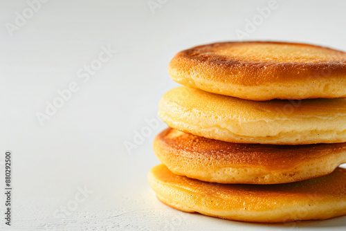 a stack of three pancakes sitting on top of each other photo