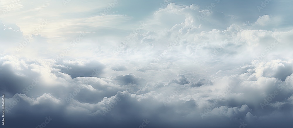 Artistic widescreen panoramic cloudscape with a moody, dramatic cloudy sky providing a captivating copy space image. Artistic widescreen panoramic cloudscape with a moody, dramatic cloudy sky providing a captivating copy space image.