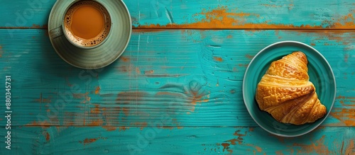 Croissant and coffee displa...