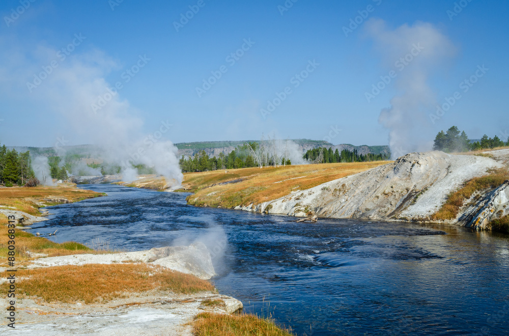 Firehole River, Yellowstone National Park, Wyoming, USA. The Firehole River flows through several significant geyser basins in the park