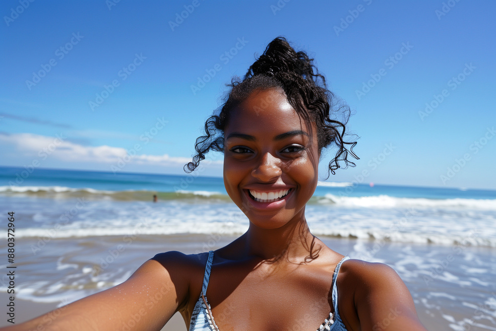 Happy young black woman taking a selfie on the beach Happy young black woman taking a selfie on the beach