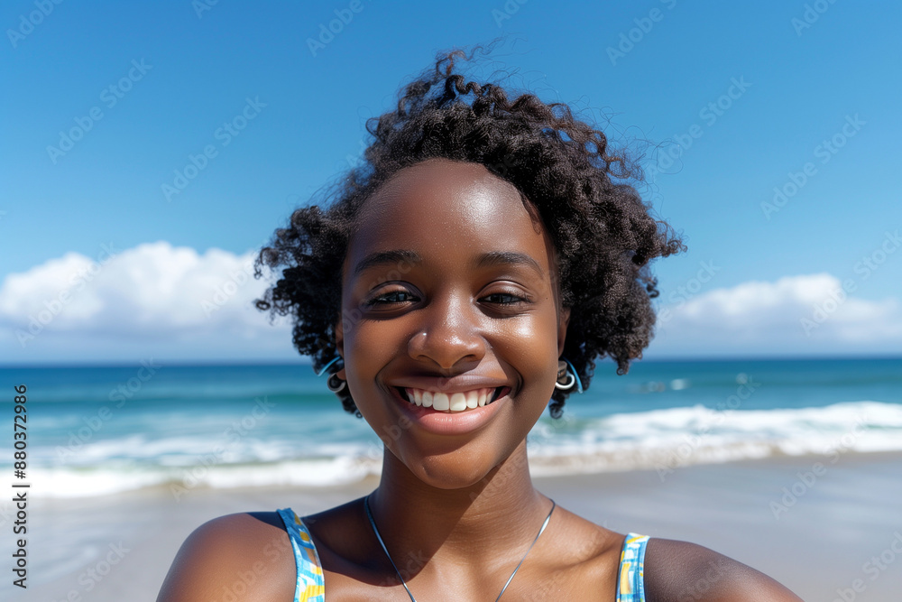 Happy young black woman taking a selfie on the beach Happy young black woman taking a selfie on the beach