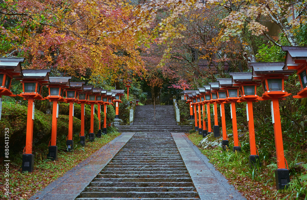 Traditional lamp posts beside the stairs in the Kurama Dera Temple, Kyoto, Japan. Traditional lamp posts beside the stairs in the Kurama Dera Temple, Kyoto, Japan.