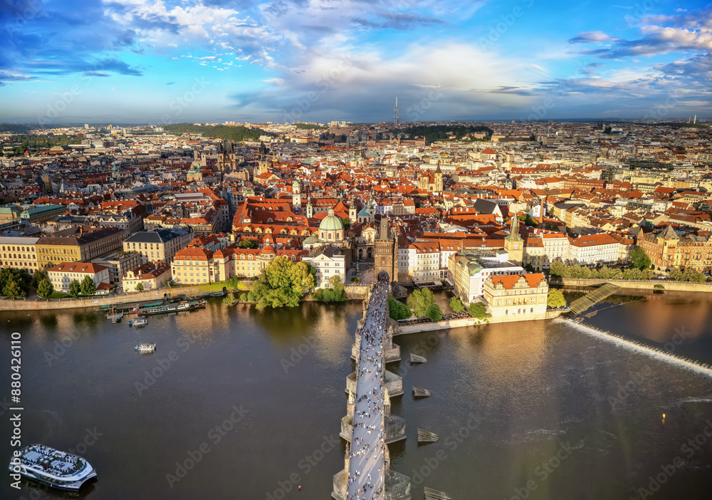 Aerial view of the cityscape of the old town of Prague, Czech Republic, during a colorful summer sunset Aerial view of the cityscape of the old town of Prague, Czech Republic, during a colorful summer sunset