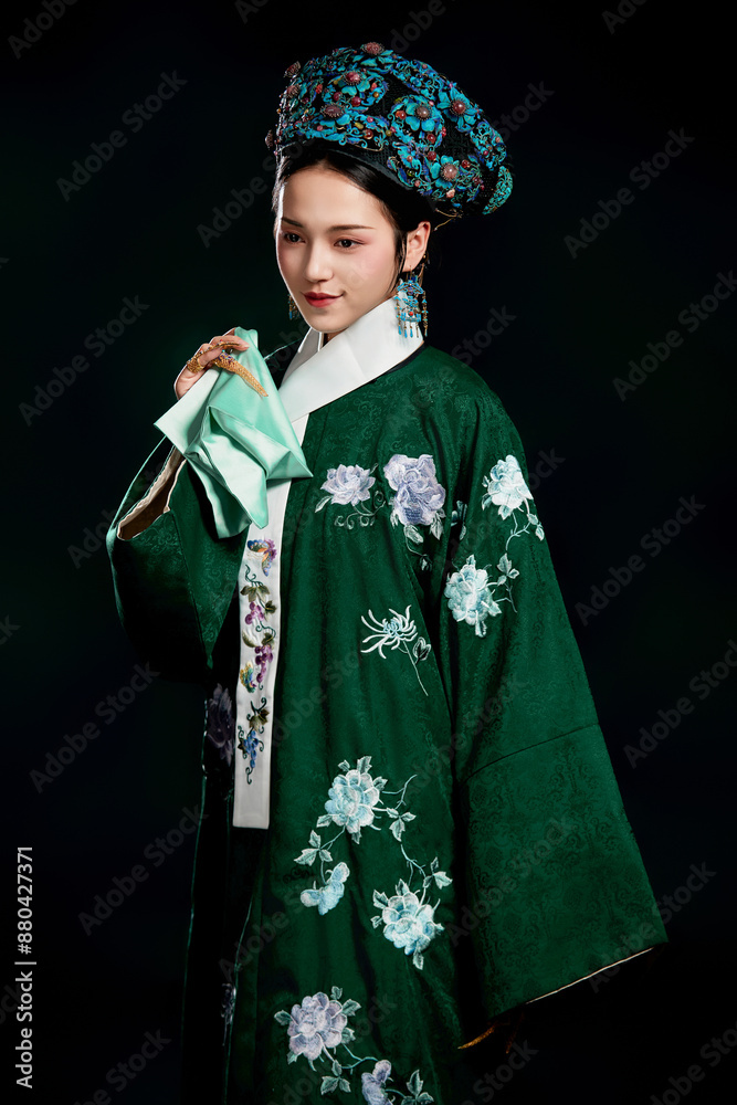 Asian,woman,showing,court,costumes,of,the,Qing,Dynasty,in,China Asian,woman,showing,court,costumes,of,the,Qing,Dynasty,in,China