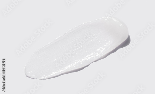 sample smear of cosmetic peeling gel on a light gray background close-up