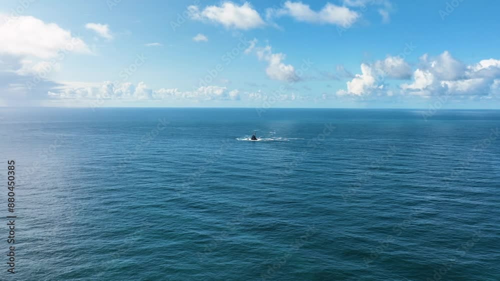 A lighthouse rising out of the ocean. Fastnet lighthouse 4k A lighthouse rising out of the ocean. Fastnet lighthouse 4k