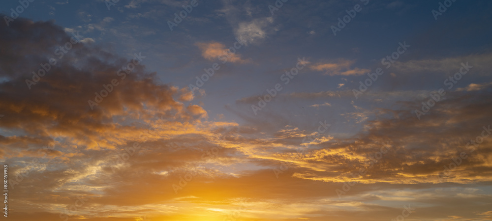Sunrise background. Dramatic sunset background. Sky with clouds in Sunrise sky light background. Sunrise with clouds in various shapes background. Calm Sunrise. Sunrise background. Dramatic sunset background. Sky with clouds in Sunrise sky light background. Sunrise with clouds in various shapes background. Calm Sunrise.