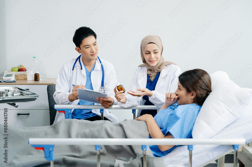 Doctors providing attentive care to a patient in a hospital bed. Compassion, professionalism, and expert healthcare. Ideal for medical Doctors providing attentive care to a patient in a hospital bed. Compassion, professionalism, and expert healthcare. Ideal for medical