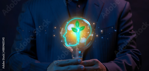 Ecological, ESG, renewable green energy and save the world sustainable. Sharing, reusing and environmental care. Businessman holding lightbulb to show tree inside head human neon line icon.