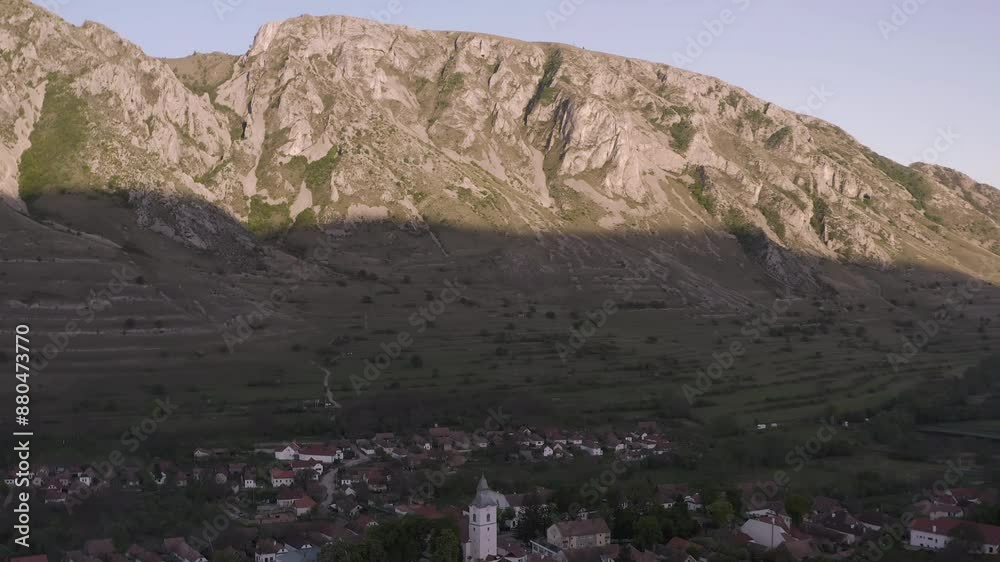 Aerial View Of Rimetea Village With Piatra Secuiului Mountains In The Background In Romania Aerial View Of Rimetea Village With Piatra Secuiului Mountains In The Background In Romania
