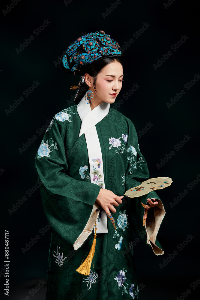 Asian,woman,showing,court,costumes,of,the,Qing,Dynasty,in,China Asian,woman,showing,court,costumes,of,the,Qing,Dynasty,in,China