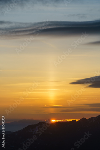 Sunrise at the summit of the mountain 