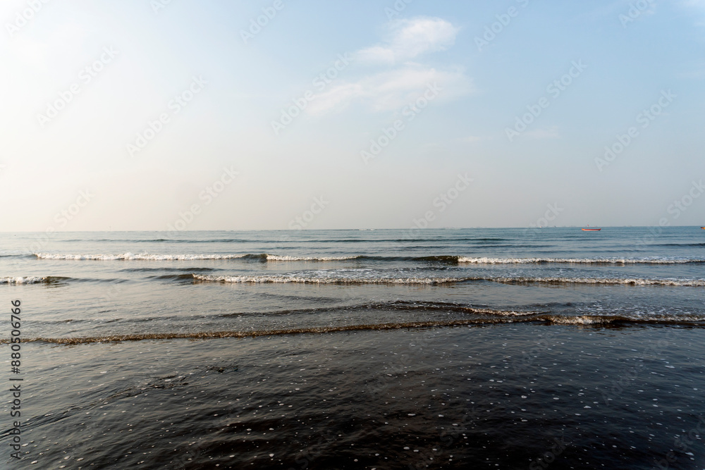 clouds in blue sky over sea and reflections of sun clouds in blue sky over sea and reflections of sun