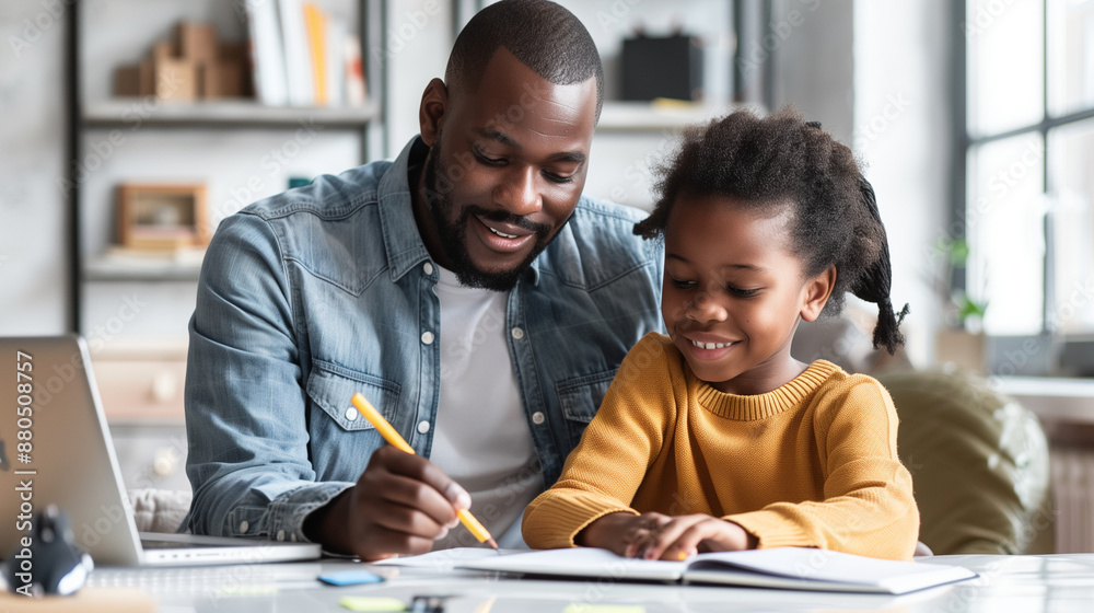 father and child happy doing homework with laptop father and child happy doing homework with laptop