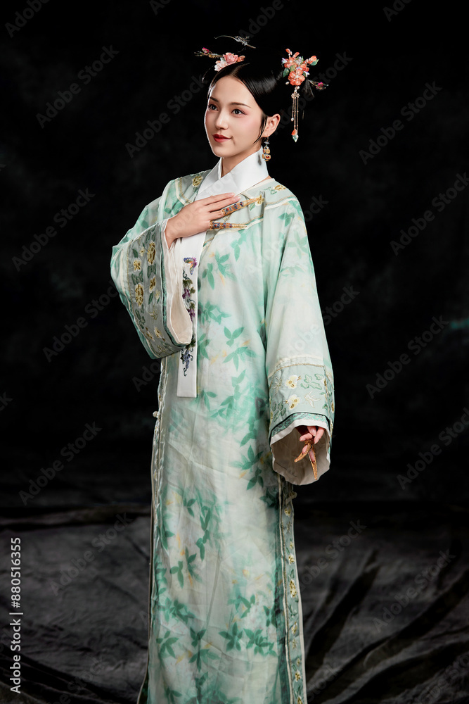 Asian,woman,showing,court,costumes,of,the,Qing,Dynasty,in,China Asian,woman,showing,court,costumes,of,the,Qing,Dynasty,in,China