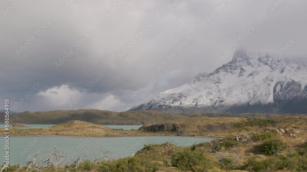 a panning shot of lago nordenskjold from the mirador cuernos trail on a stormy autumn day at torres del paine national park in patagonia, chile a panning shot of lago nordenskjold from the mirador cuernos trail on a stormy autumn day at torres del paine national park in patagonia, chile