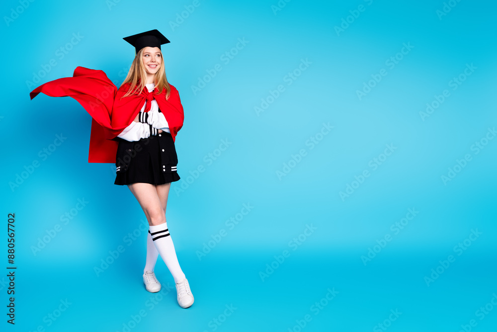 Photo of pretty cute lovely girl wear stylish clothes red cape hat long socks empty space isolated on blue color background Photo of pretty cute lovely girl wear stylish clothes red cape hat long socks empty space isolated on blue color background