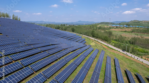 Vast Solar Farm Amidst Scenic Countryside Landscape