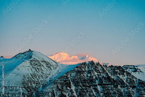 Snow-covered mountain peaks in Skaftafell, Iceland photo