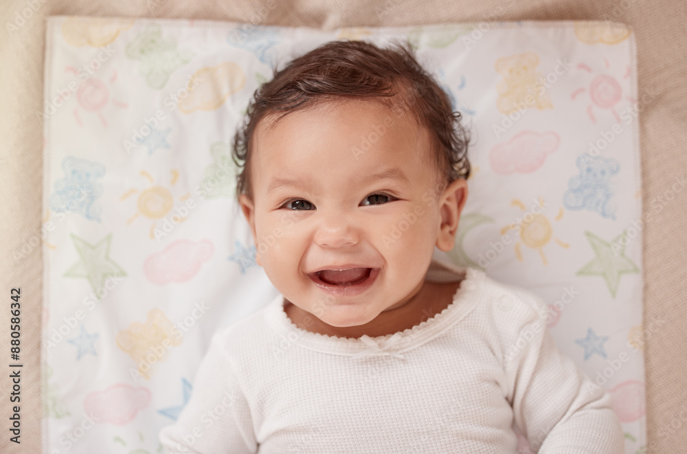 Baby, portrait and girl on bedroom bed with smile, relax and calm in nursery after rest. Young newborn, child and kid with happiness with morning, wellbeing and childcare from above in house or home Baby, portrait and girl on bedroom bed with smile, relax and calm in nursery after rest. Young newborn, child and kid with happiness with morning, wellbeing and childcare from above in house or home