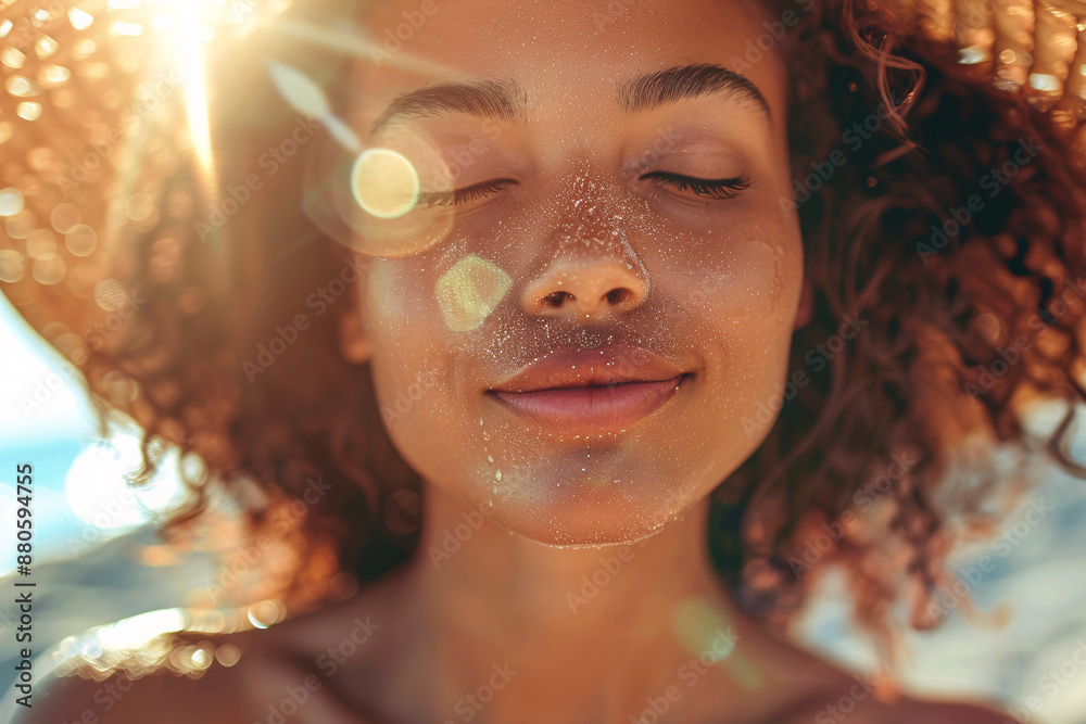 A close-up of a woman with closed eyes and a smile, enjoying the warm sunlight on her face, wearing a sun hat A close-up of a woman with closed eyes and a smile, enjoying the warm sunlight on her face, wearing a sun hat