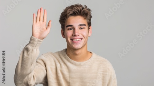 The young man waving photo