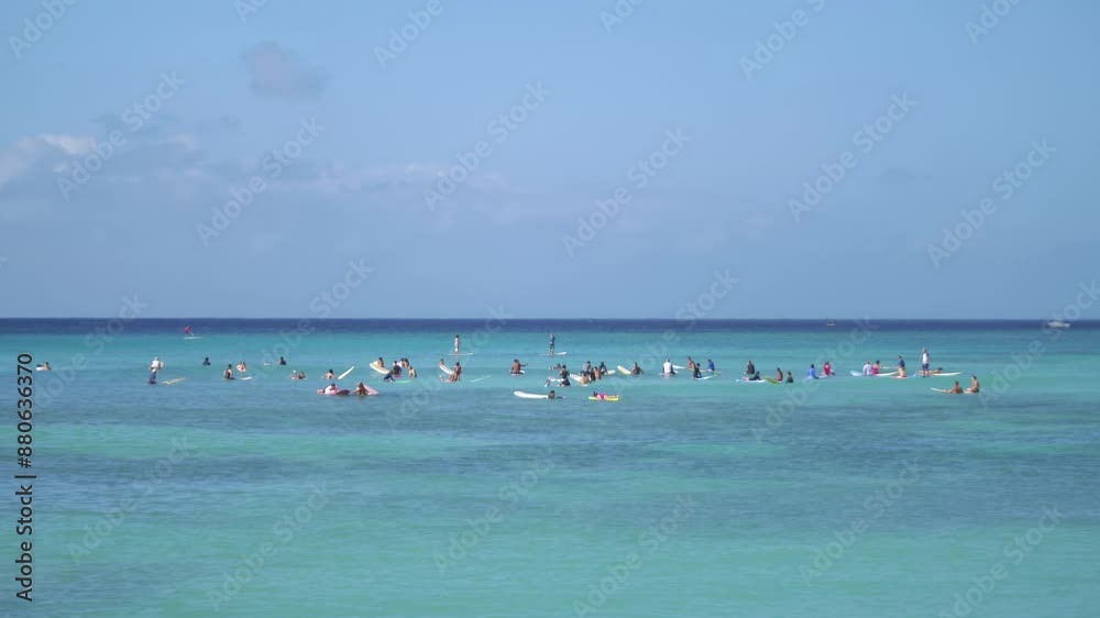 Surfers waiting for waves on azure water in Hawaii in 4k Surfers waiting for waves on azure water in Hawaii in 4k
