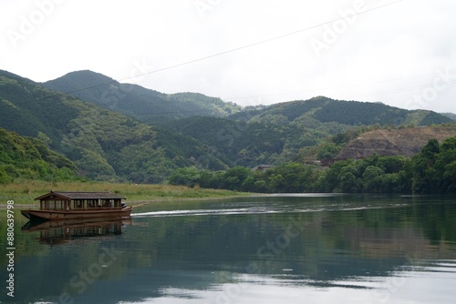 Scenery of Shimanto River and Yakatabune in the rain photo