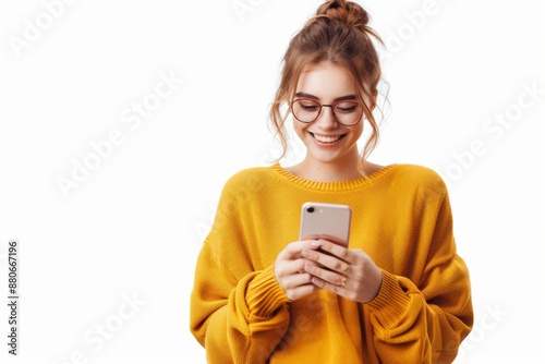 Happy young woman smiling while interacting with her smartphone, dressed in a cozy yellow sweater. Generated AI