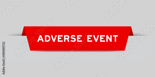 Red color inserted label with word adverse event on gray background