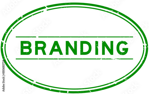 Grunge green branding word oval rubber seal stamp on white background