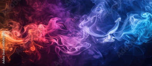 Vibrant smoke on a dark backdrop creates a mesmerizing copy space image