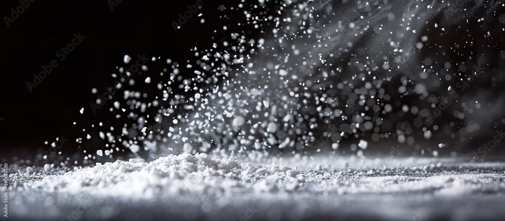 Capturing a still moment of white powder against a dark backdrop in the copy space image Capturing a still moment of white powder against a dark backdrop in the copy space image