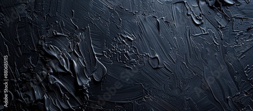 Canvas background textured with black oil paint provides ample copy space for design