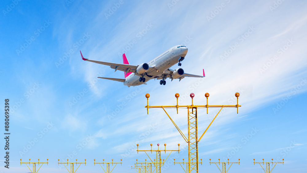 Passenger plane fly up over take-off runway from airport in the foreground Yellow fogbound departure lights guide airplanes Passenger plane fly up over take-off runway from airport in the foreground Yellow fogbound departure lights guide airplanes
