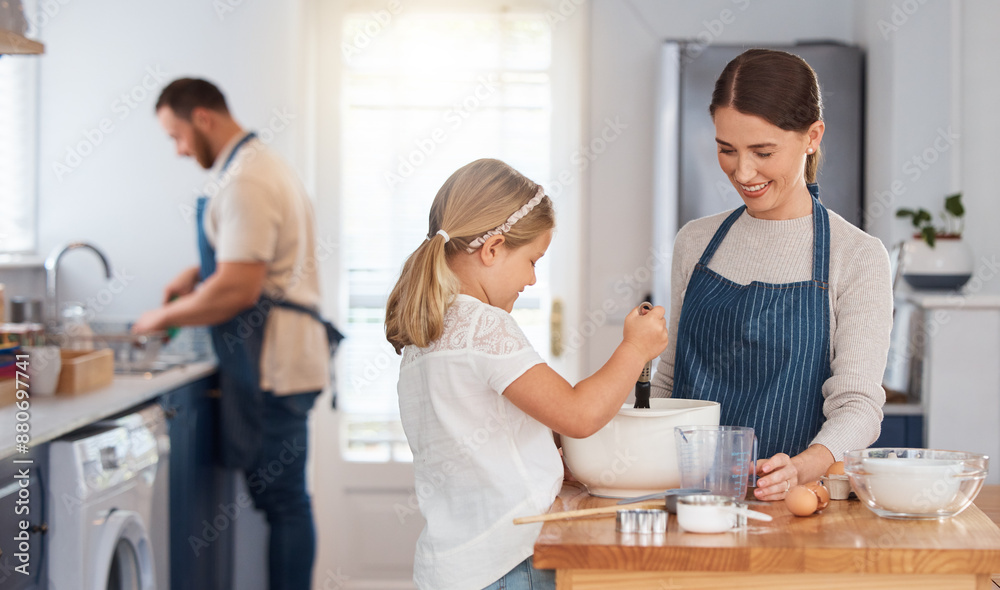 Family, child and bake in home kitchen, woman and kid assisting for culinary skills or bonding together. Man, cleaning and kid development or mixing ingredients, apartment and support for love Family, child and bake in home kitchen, woman and kid assisting for culinary skills or bonding together. Man, cleaning and kid development or mixing ingredients, apartment and support for love