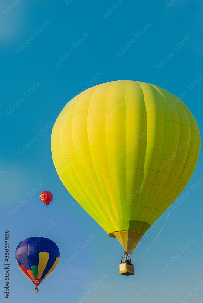 Fototapeta premium Three colorful balloons in the sky