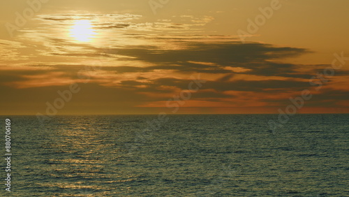 Sun Rises Above Sea. Abstract Summer Natural Background. Sunrise Over Calm Sea. Real time.