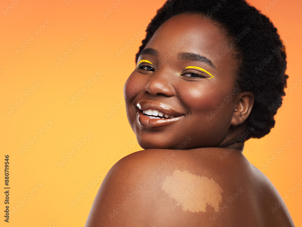 Portrait, makeup and black woman with cosmetics, dermatology and shine on yellow studio background. African person, face or model with beauty, pigmentation or birthmark with aesthetic or glow Portrait, makeup and black woman with cosmetics, dermatology and shine on yellow studio background. African person, face or model with beauty, pigmentation or birthmark with aesthetic or glow